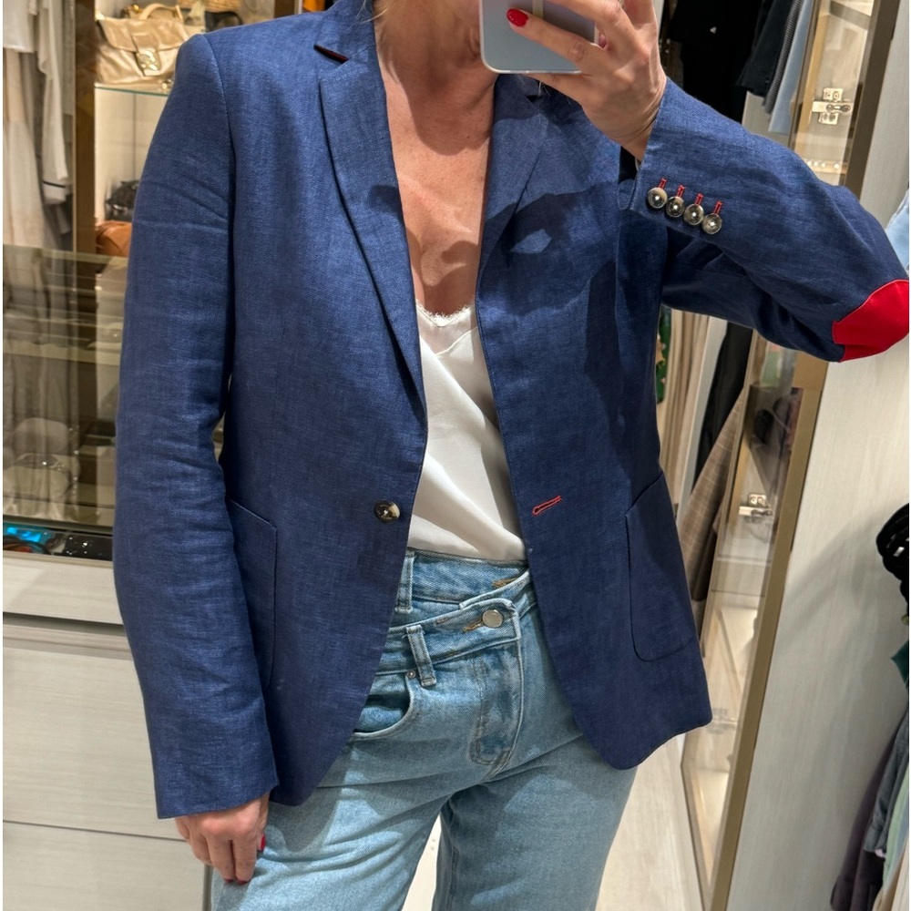 EL GANSO jacket with red blue patch on the elbow.